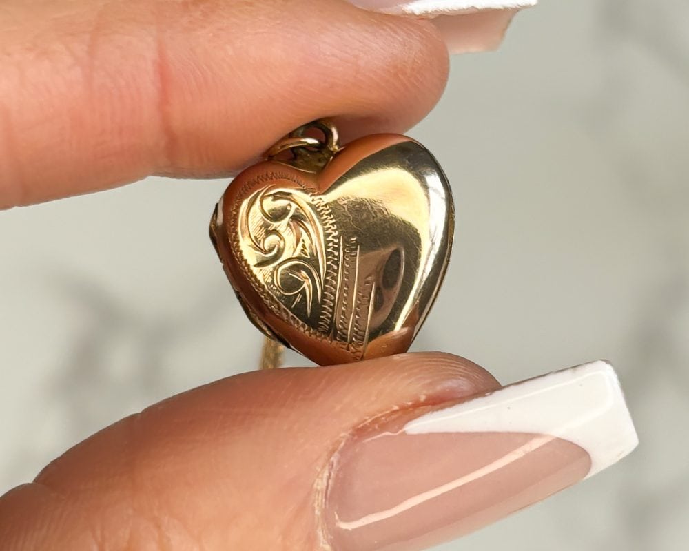 Vintage gold heart locket and chain for sale in Leeds, Yorkshire