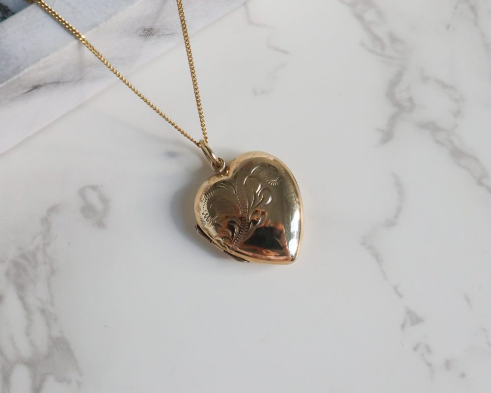 Vintage gold heart locket and chain for sale in Leeds, Yorkshire