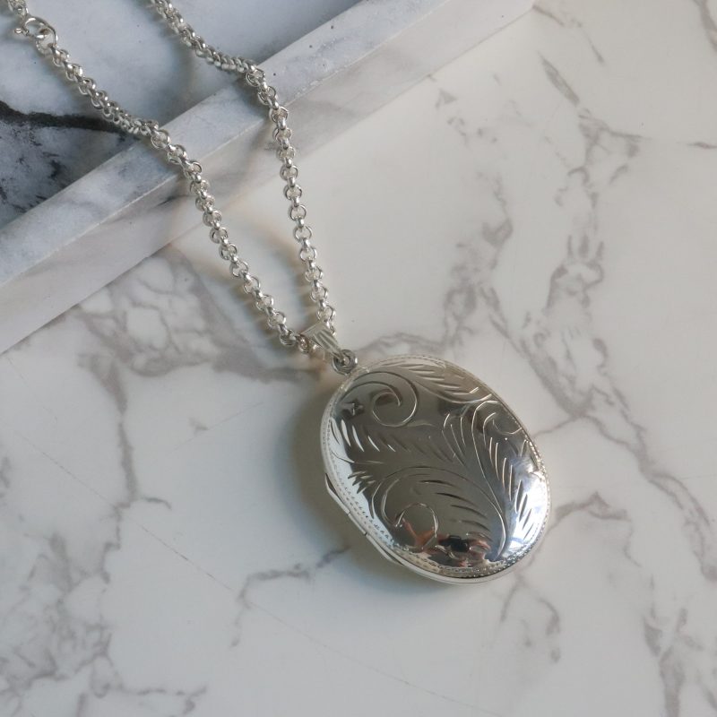 Vintage style silver engraved oval locket and chain for sale in Leeds, Yorkshire