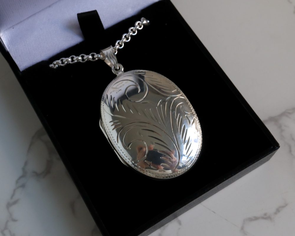 Vintage style silver engraved oval locket and chain for sale in Leeds, Yorkshire