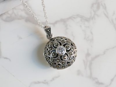 Vintage style silver, marcasite and cubic zirconia round locket and chain for sale in Leeds, Yorkshire