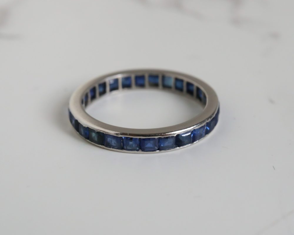 Antique Art Deco sapphire eternity ring in platinum for sale in Leeds, Yorkshire