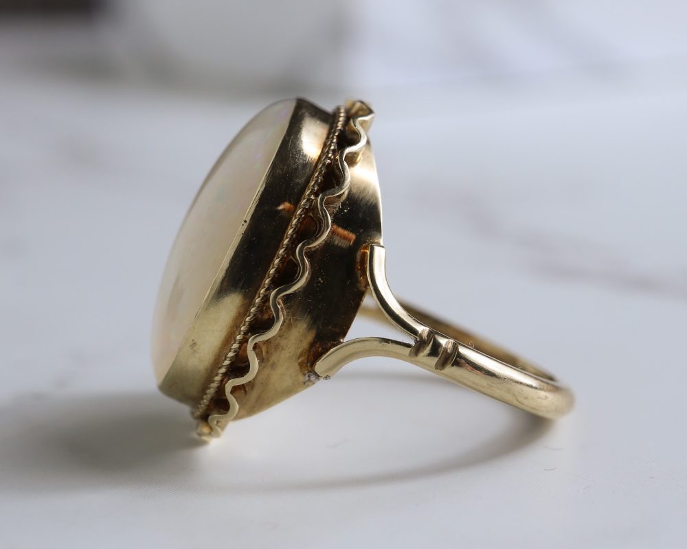 Vintage oval opal dress ring in 9ct yellow gold for sale in Leeds, Yorkshire