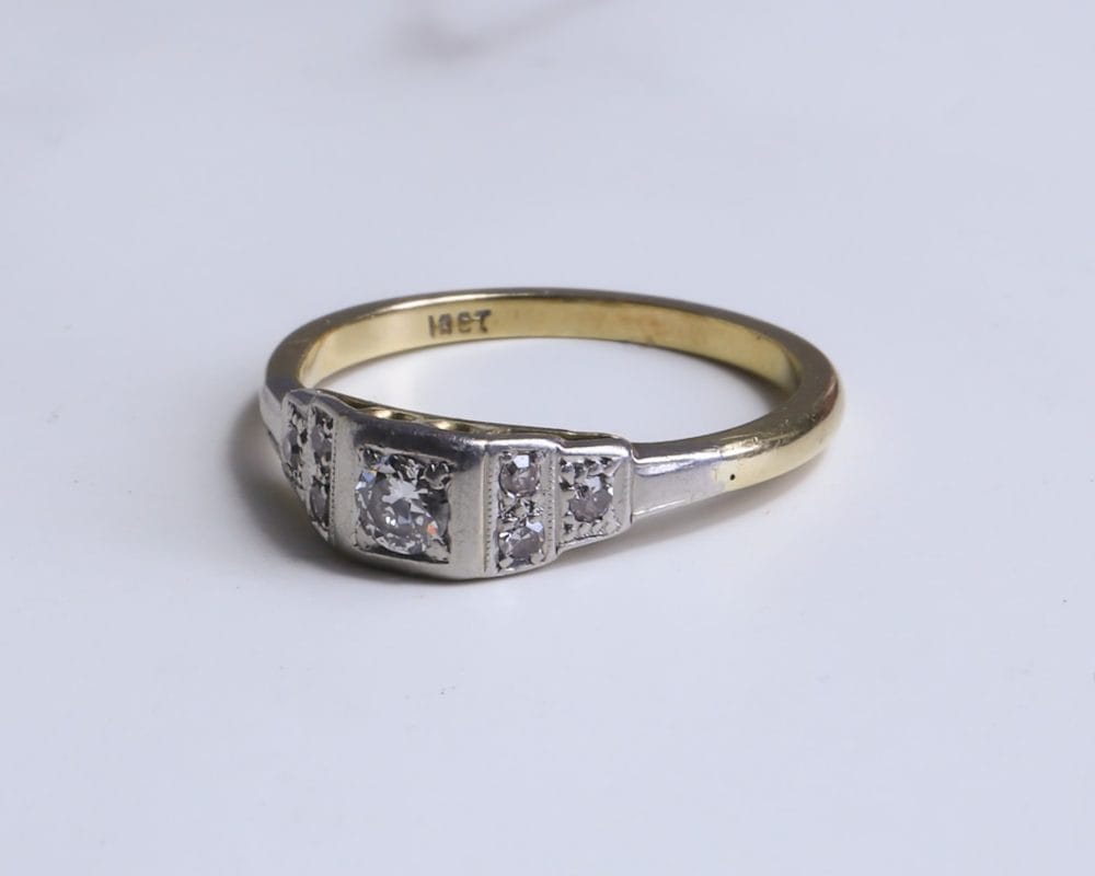 Art Deco diamond stepped shoulder ring in 18ct yellow gold and platinum for sale in Leeds, Yorkshire