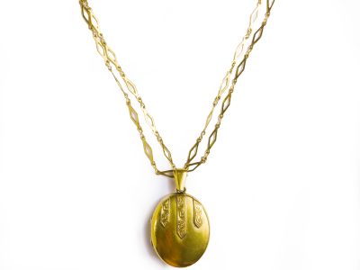 Antique gold coloured locket and vintage long chain for sale in Leeds, Yorkshire