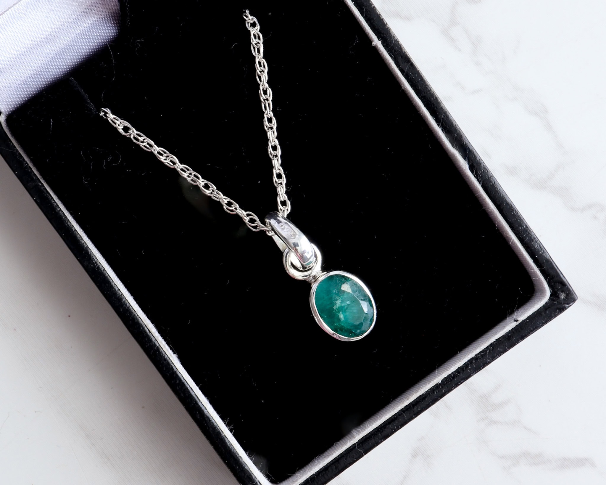 Silver and emerald oval pendant on an 18 inch silver chain for sale in Leeds, Yorkshire