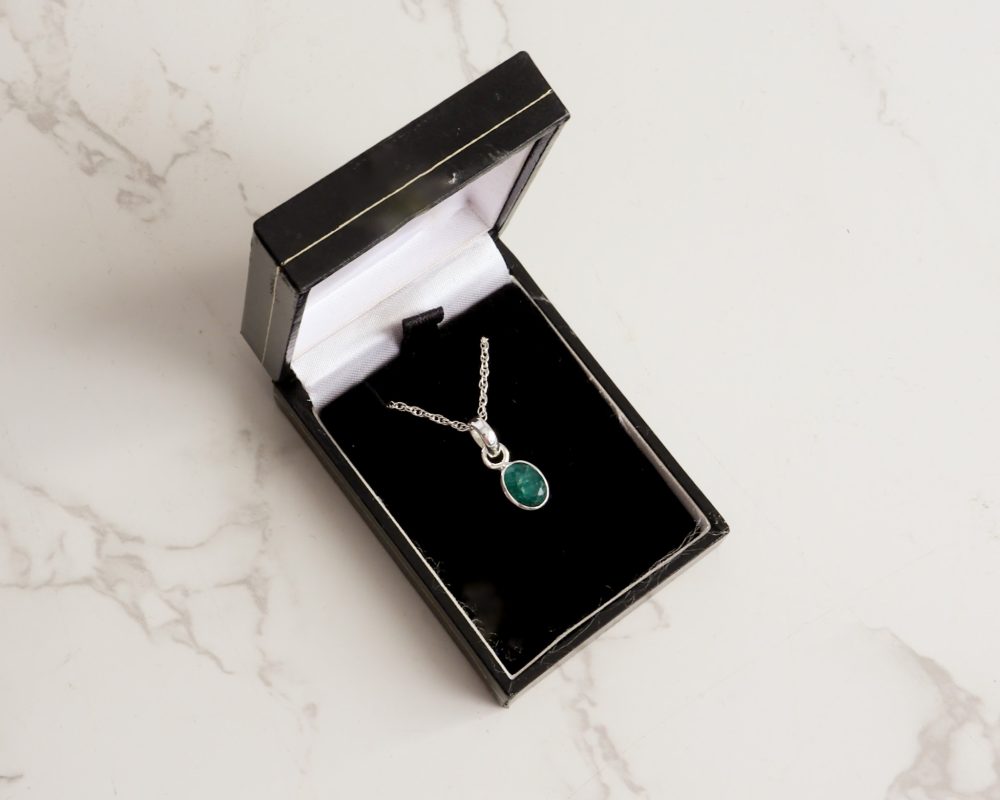 Silver and emerald oval pendant on an 18 inch silver chain for sale in Leeds, Yorkshire