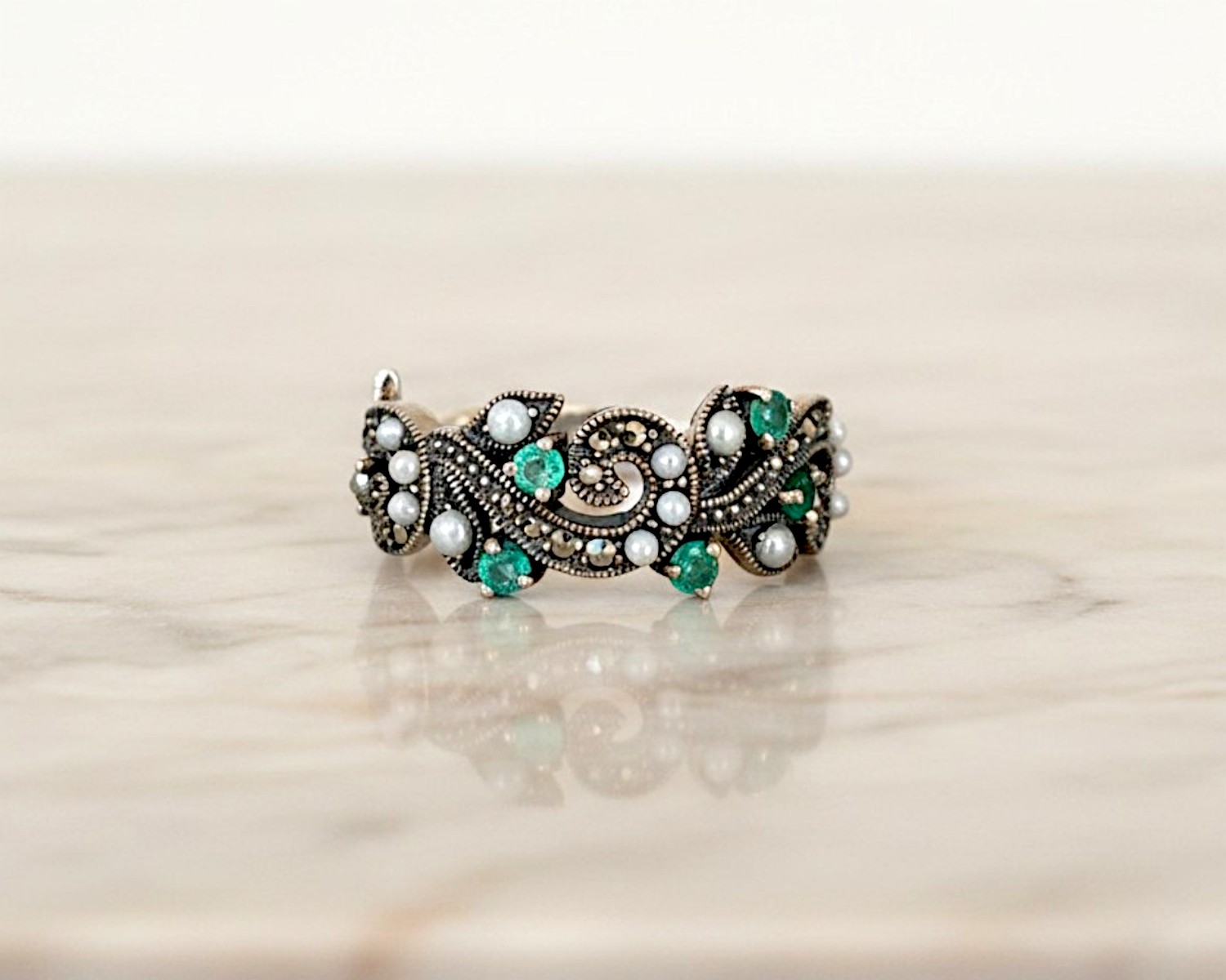 emerald and silver ring