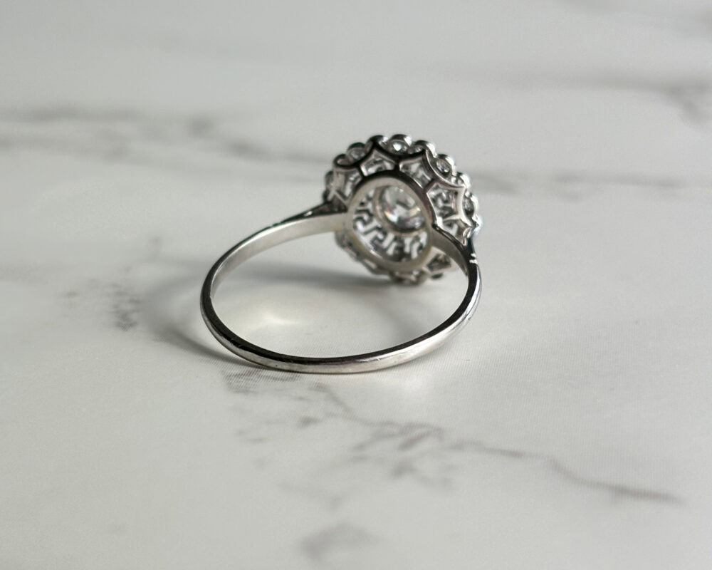 Antique Art Deco diamond ring with Greek key pattern in platinum for sale in Leeds, Yorkshire