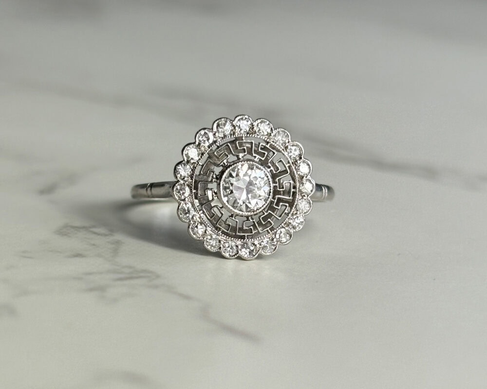 Antique Art Deco diamond ring with Greek key pattern in platinum for sale in Leeds, Yorkshire