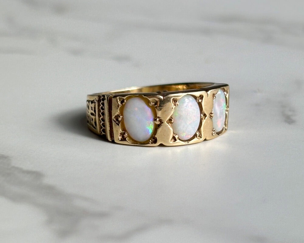 vintage opal and 9ct gold three stone band ring for sale in Leeds