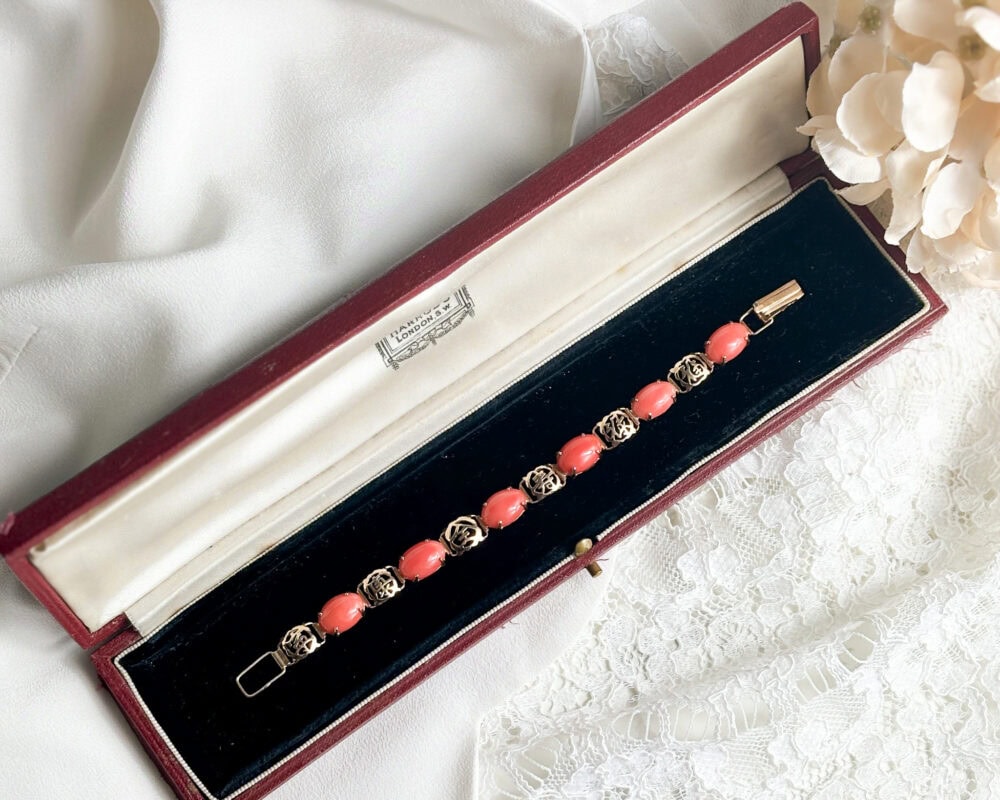 vintage 18ct gold and coral bracelet with chinese character links