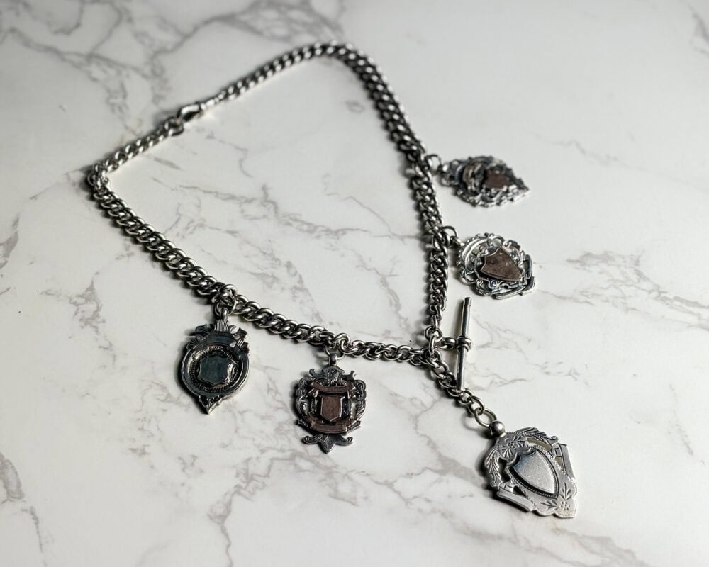 heavy antique silver albert chain with 5 medal fobs