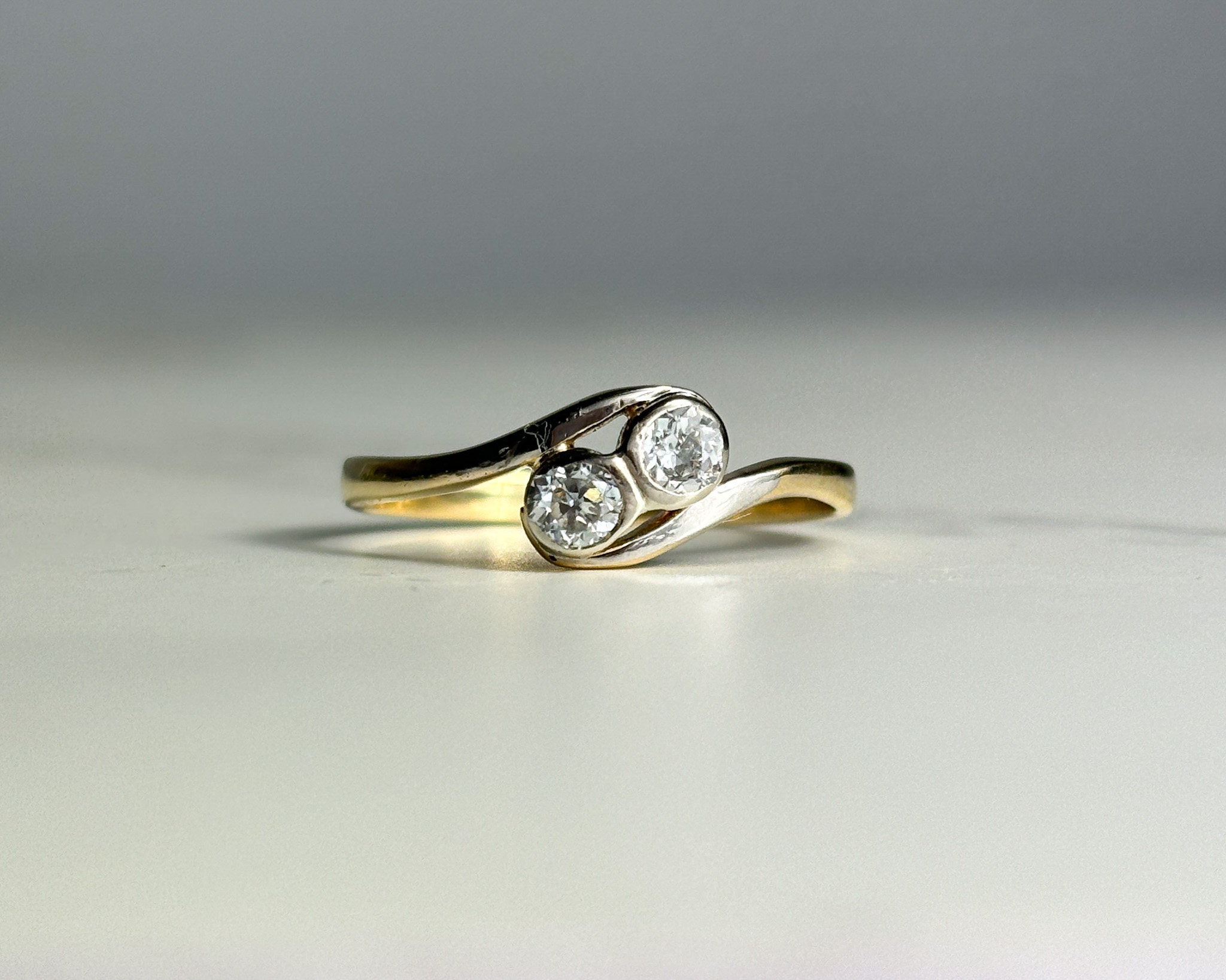 antique 1920s diamond toi et moi ring in 18ct yellow gold and platinum