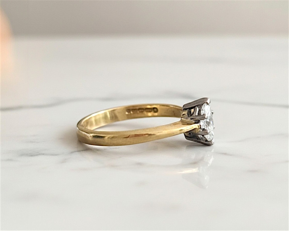 vintage marquise cut diamond solitaire ring showing side view