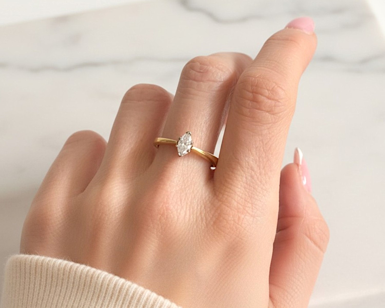 marquise ring on finger