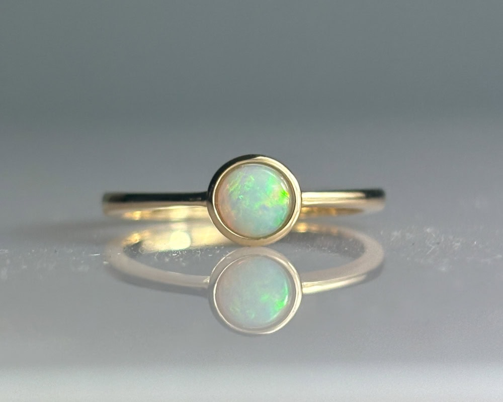 modern 9ct gold bezel set opal ring for sale