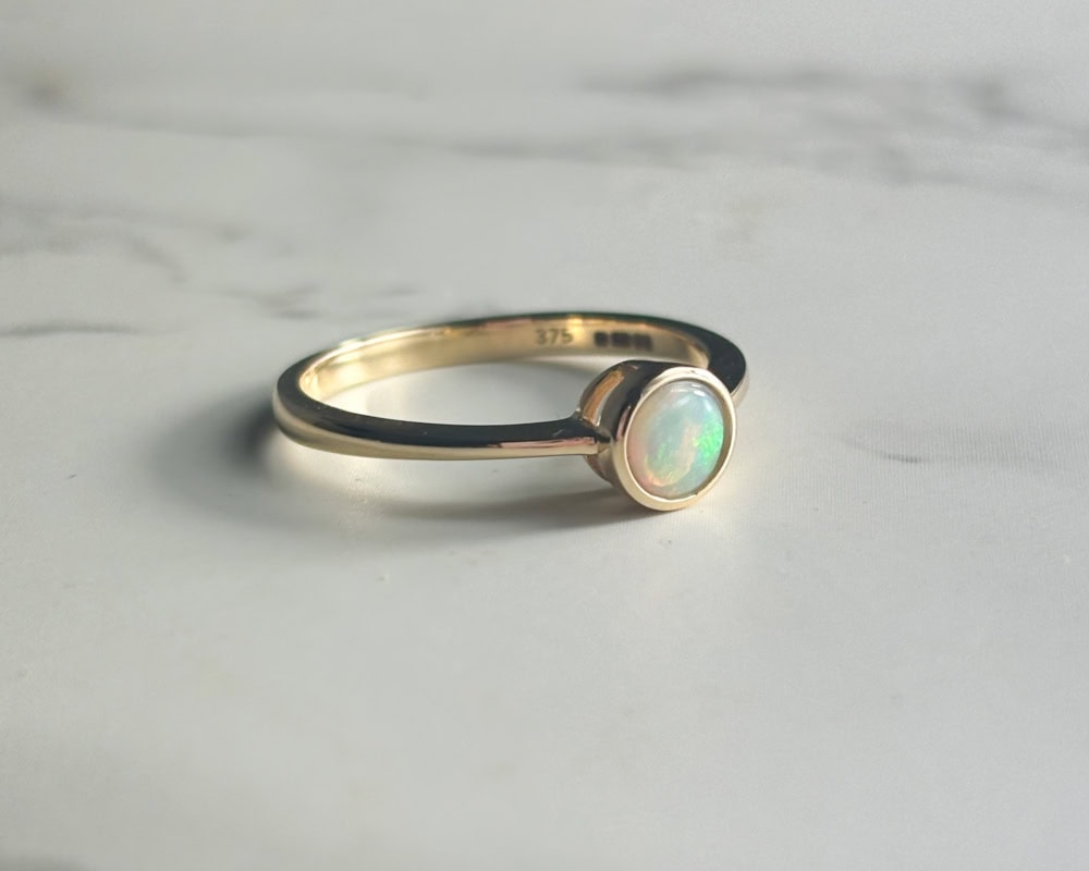 modern 9ct gold bezel set opal ring for sale