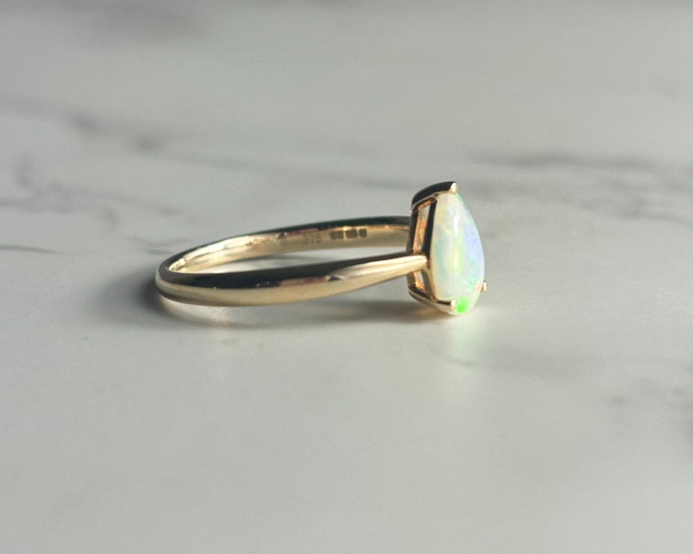 modern 9ct yellow gold pear cut opal ring for sale
