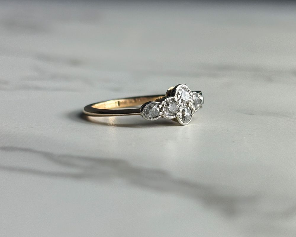 Art Deco six stone diamond ring in 18ct gold and platinum for sale