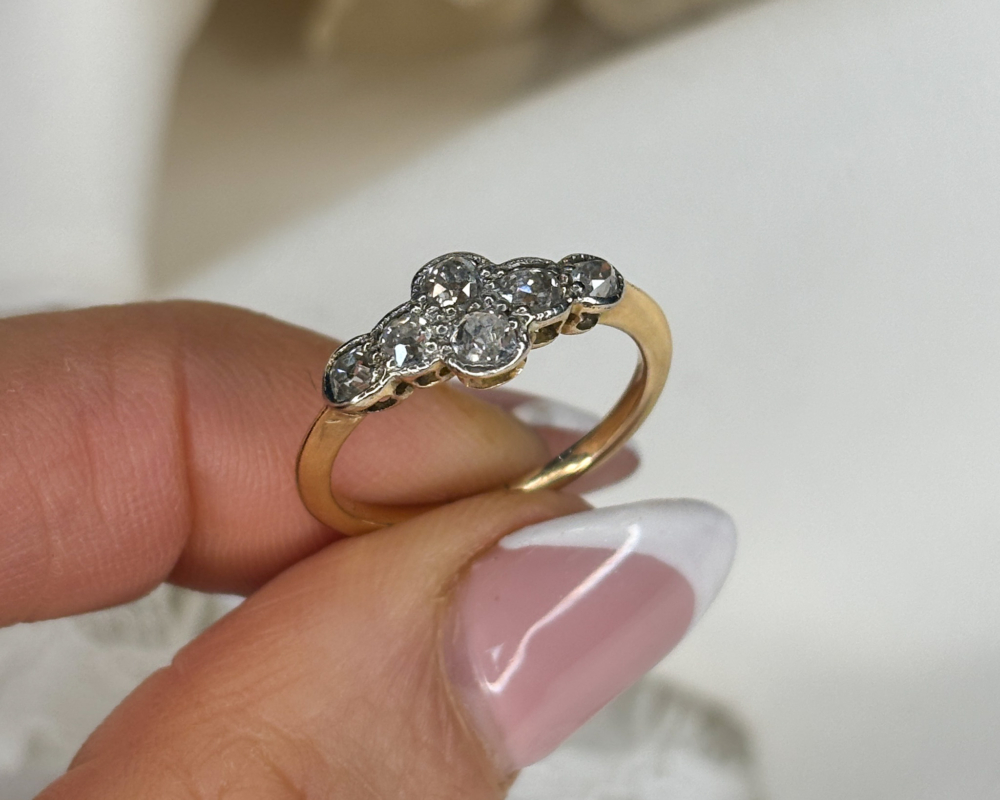 Art Deco six stone diamond ring in 18ct gold and platinum for sale