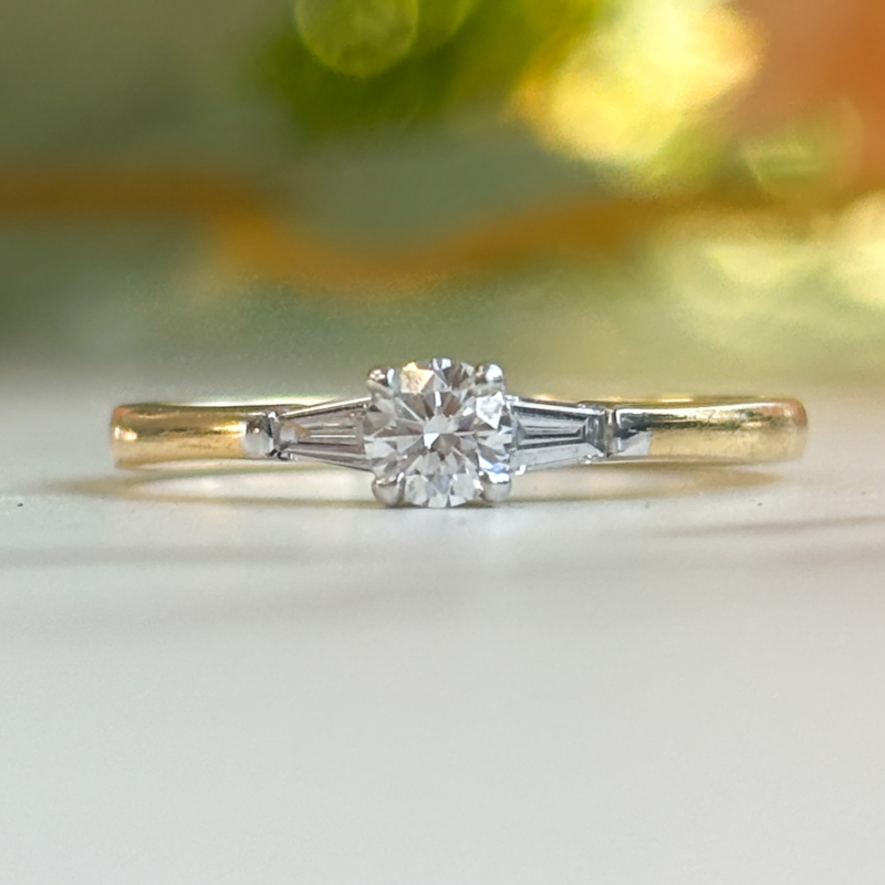 18ct gold diamond solitaire ring with baguette diamond shoulders for sale in Leeds UK