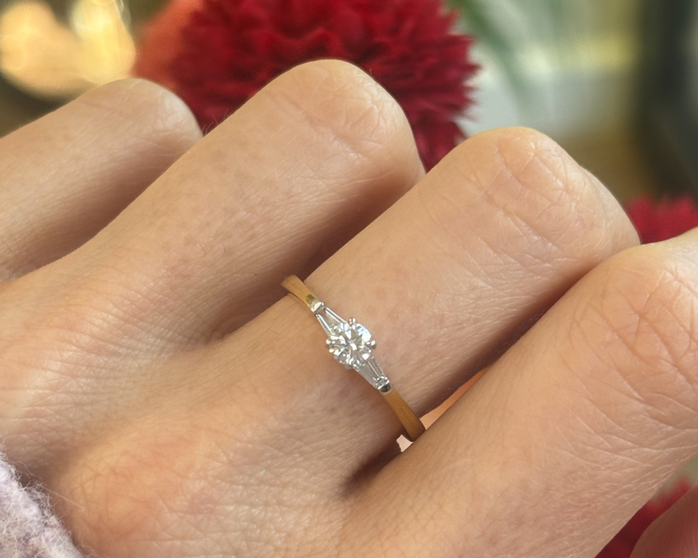 18ct gold diamond solitaire ring with baguette diamond shoulders for sale in Leeds UK