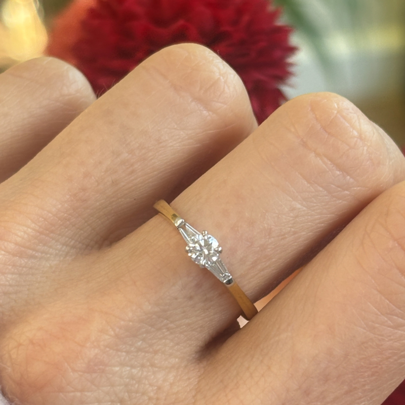 18ct gold diamond solitaire ring with baguette diamond shoulders for sale in Leeds UK