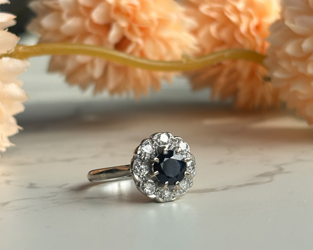 1940s sapphire and diamond cluster ring in 18ct white gold for sale in Leeds, UK