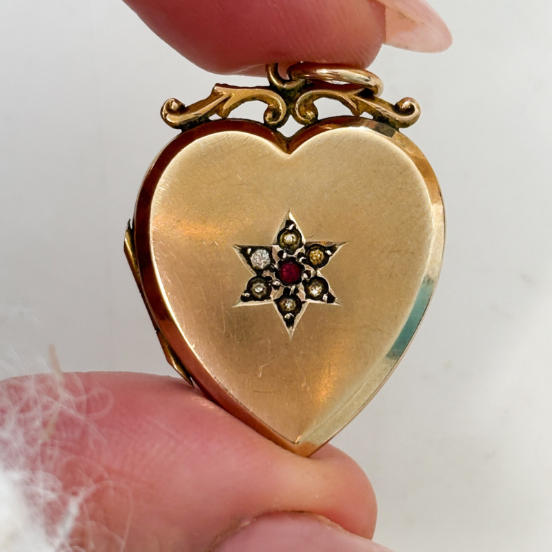 antique Edwardian heart locket with old photos inside in Leeds, Yorkshire