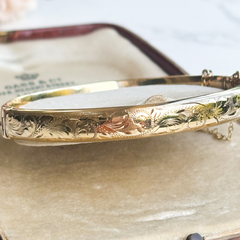 vintage 9ct gold engraved bangle on woman's wrist for sale in Leeds, Yorskhire