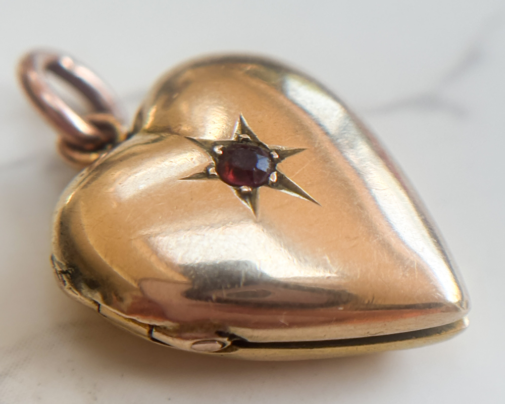 antique Victorian 9ct gold and ruby set heart locket for sale in Leeds, UK