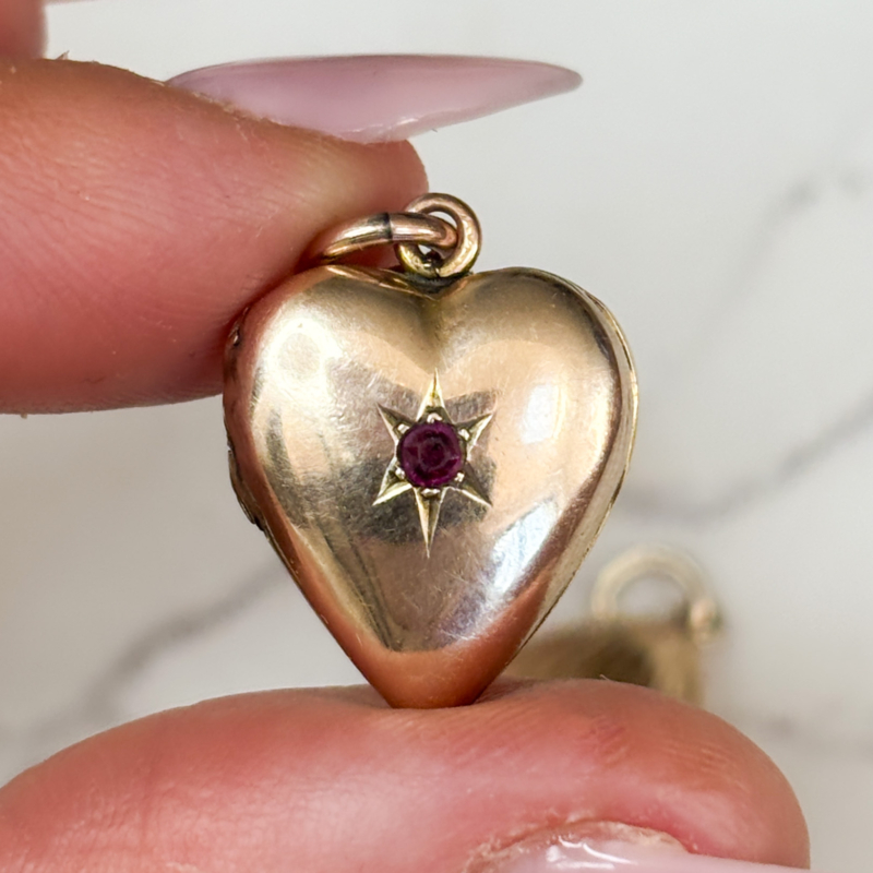 antique Victorian 9ct gold and ruby set heart locket for sale in Leeds, UK