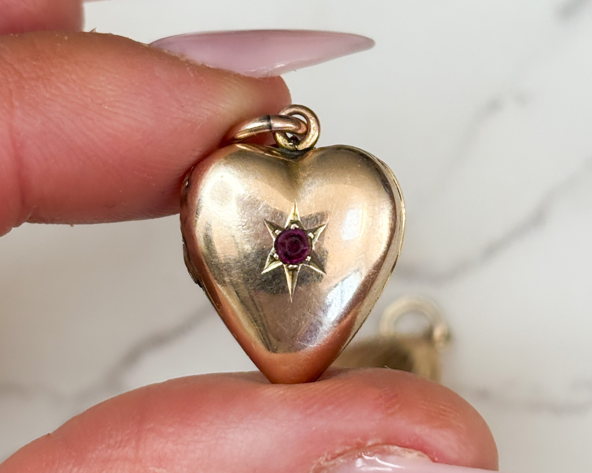 antique Victorian 9ct gold and ruby set heart locket for sale in Leeds, UK
