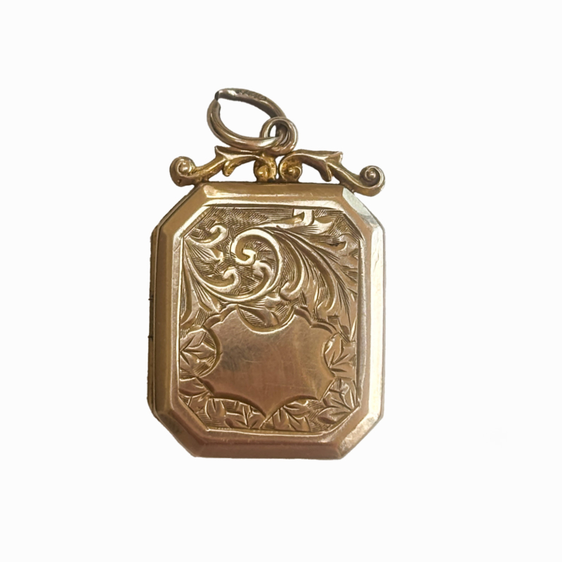 antique 9ct gold rectangular locket with scrolled engraving that opens to reveal two portrait photographs. dated Chester 1917. For sale in Leeds, Yorkshire, UK