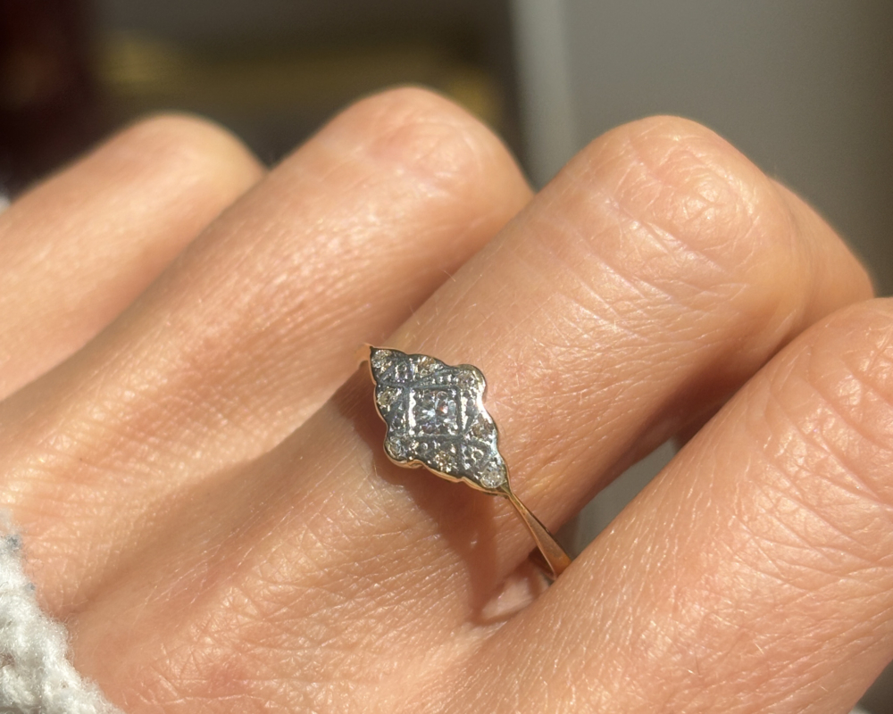Art Deco diamond cluster ring for sale in Leeds, UK shown on woman's finger