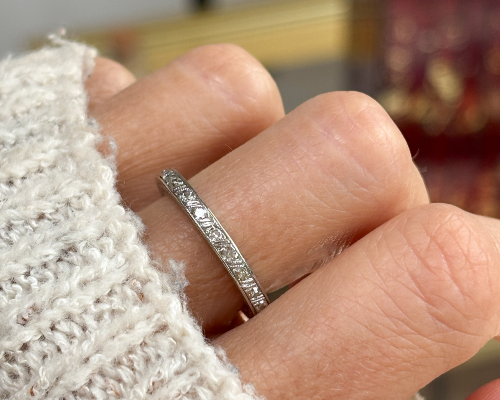 antique Art Deco 1930s diamond full eternity ring in platinum for sale in Leeds shown on lady's finger