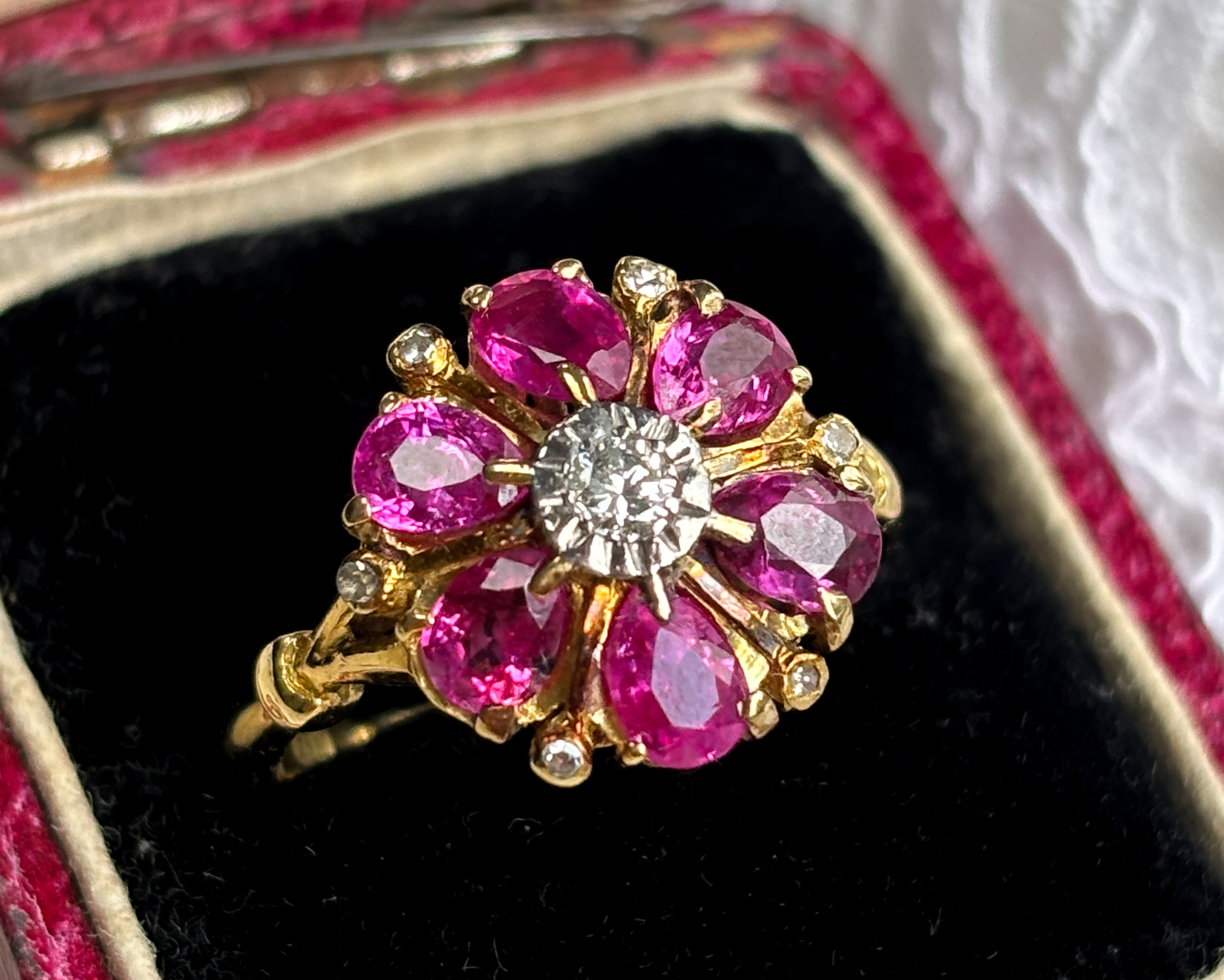vintage 1960s ruby and diamond cluster ring in 18ct gold shown in presentation box. for sale in Leeds, UK