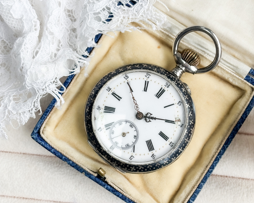 antique silver pocket watch with top winding mechanism and enamel for sale in Leeds, Uk, shown in box