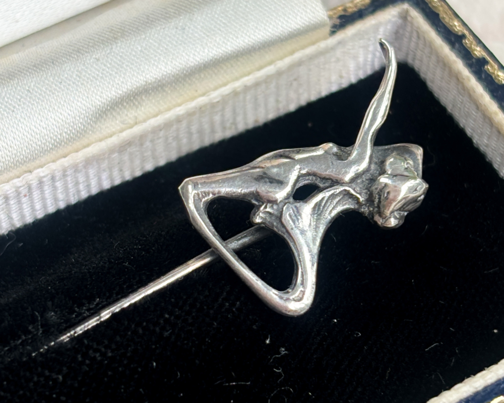 platinum art nouveau stick pin in the form of a dancer in a presentation box