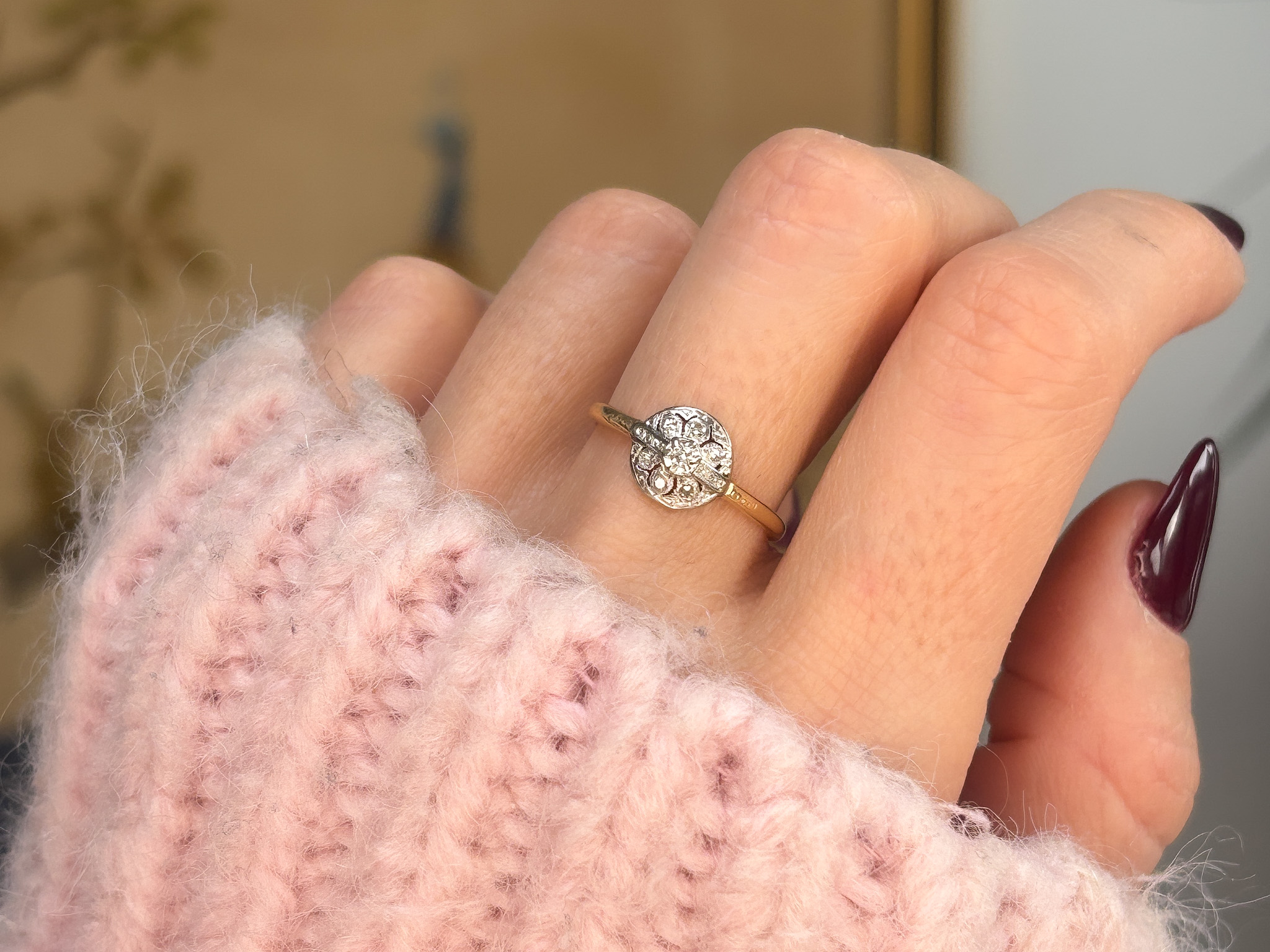 woman wearing cluster ring