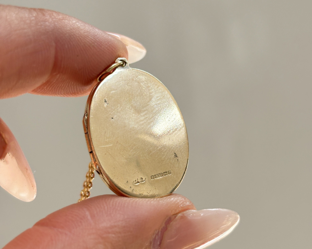 vintage 9ct gold locket, engine turned and dated 1963 for sale in Leeds, UK showing reverse