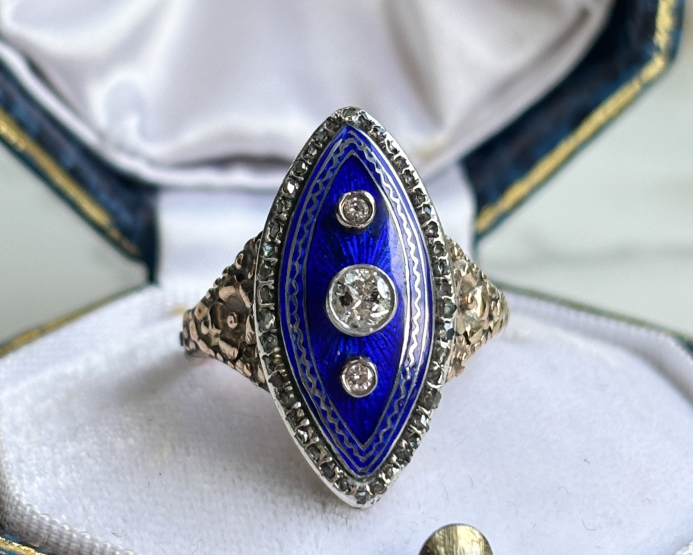 early Victorian cobalt blue enamel and old cut diamond navette ring for sale in Leeds, set in 15ct gold, shown in a presentation box