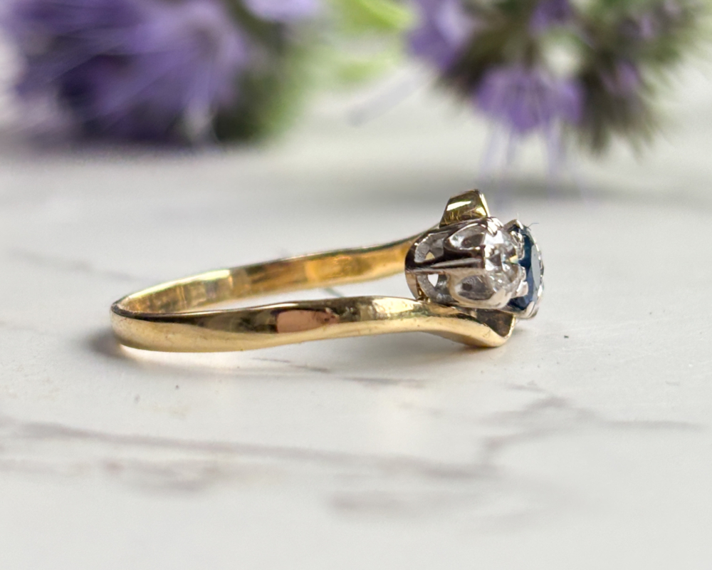 antique 1930s sapphire and diamond three stone twist ring in 18ct yellow gold for sale in Leeds, Yorkshire, showing side view