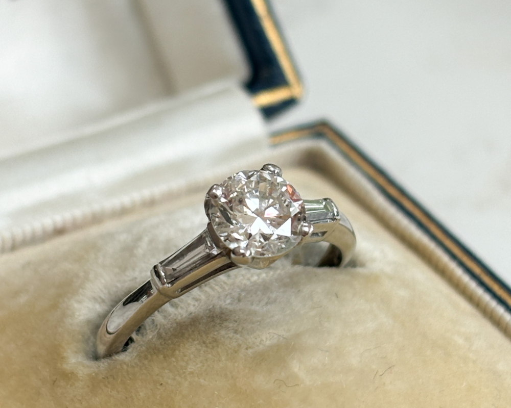 art deco diamond solitaire ring with baguette diamond shoulders 1.04ct for sale in Leeds, UK