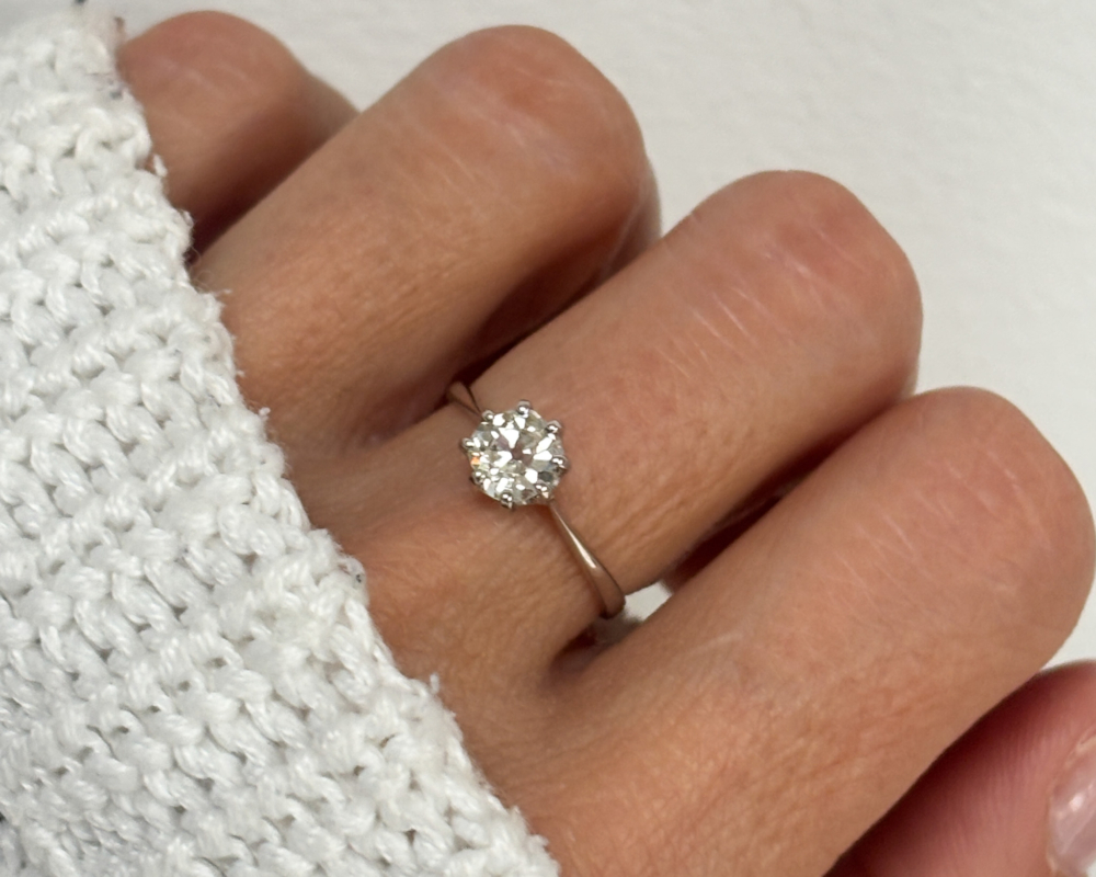 antique Edwardian diamond solitaire ring 0.5ct in 18ct white gold and platinum for sale in Leeds, UK, shown on woman's finger