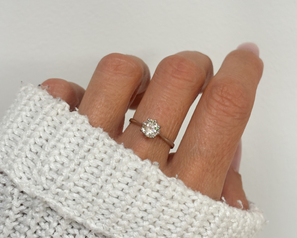 antique Edwardian diamond solitaire ring 0.5ct in 18ct white gold and platinum for sale in Leeds, UK shown on woman's finger