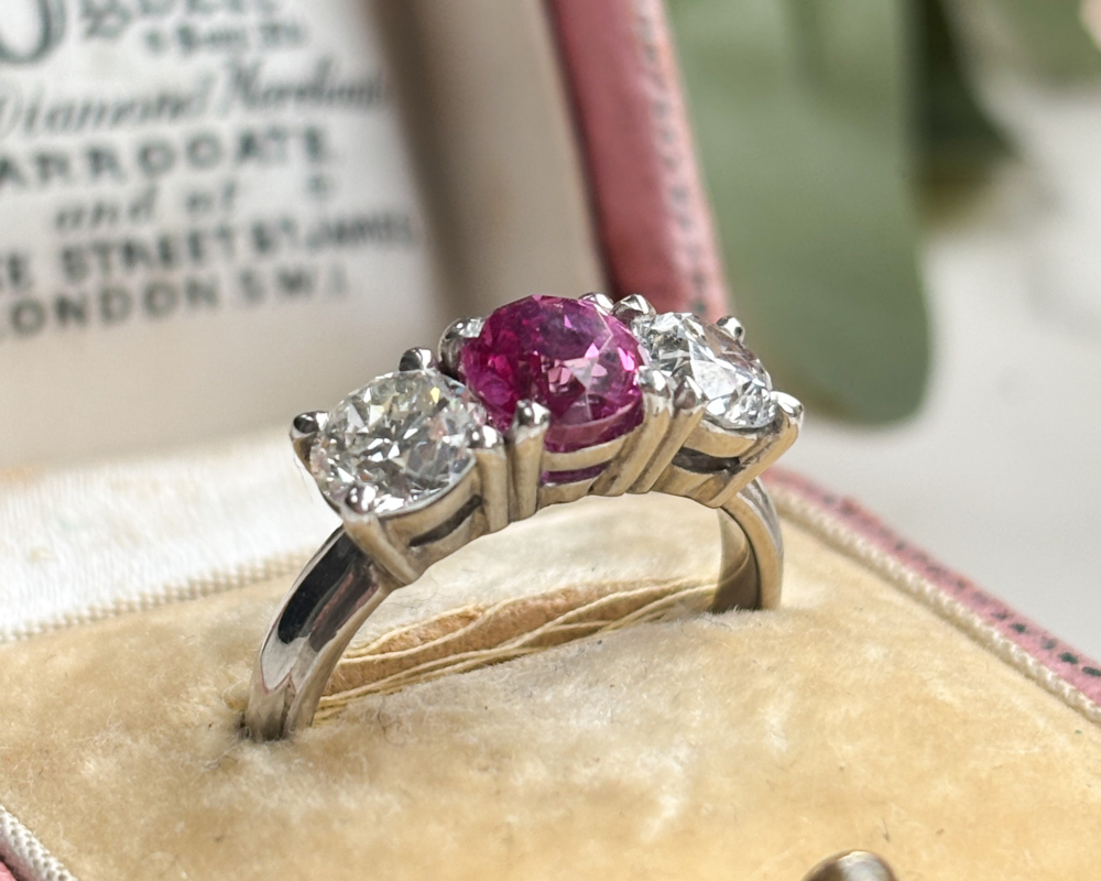 1940s untreated and natural pink sapphire and diamond three stone ring in platinum, for sale in Leeds, Yorkshire
