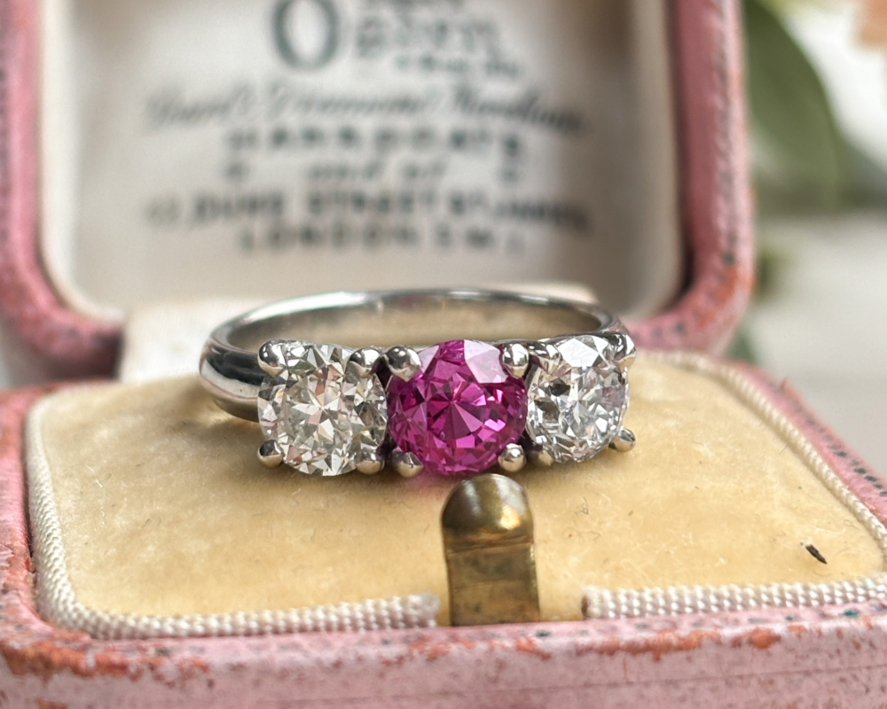 1940s untreated and natural pink sapphire and diamond three stone ring in platinum, for sale in Leeds, Yorkshire