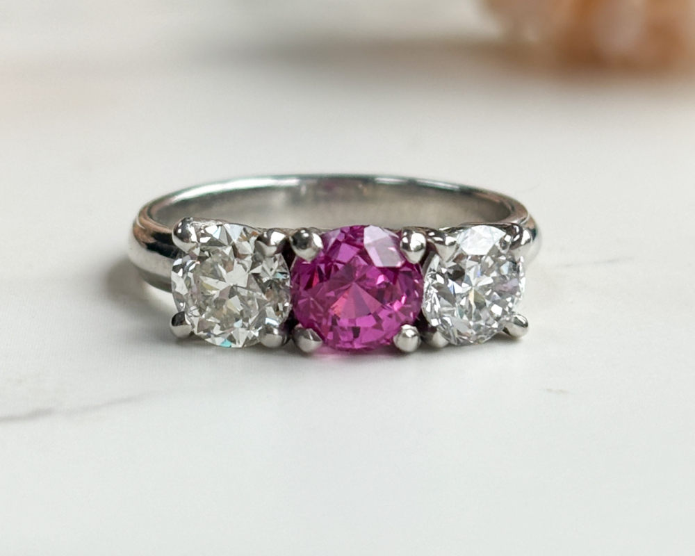 1940s untreated and natural pink sapphire and diamond three stone ring in platinum, for sale in Leeds, Yorkshire